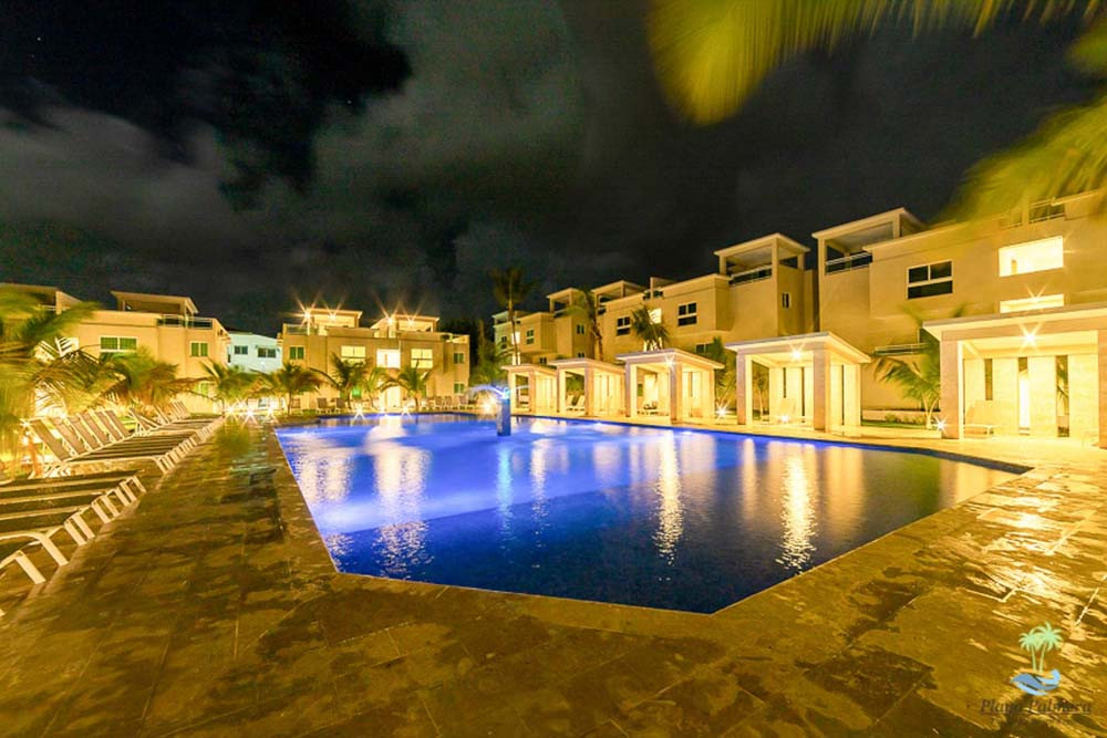 Pool by night at Beach Apartamentos Playa Palmera Beach Resort
