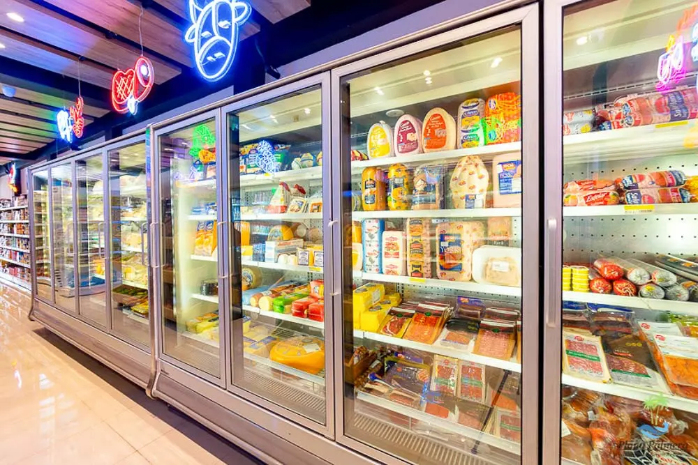 Dairy and meat refrigerators at Supermercado Palmera at Playa Palmera Beach Resort