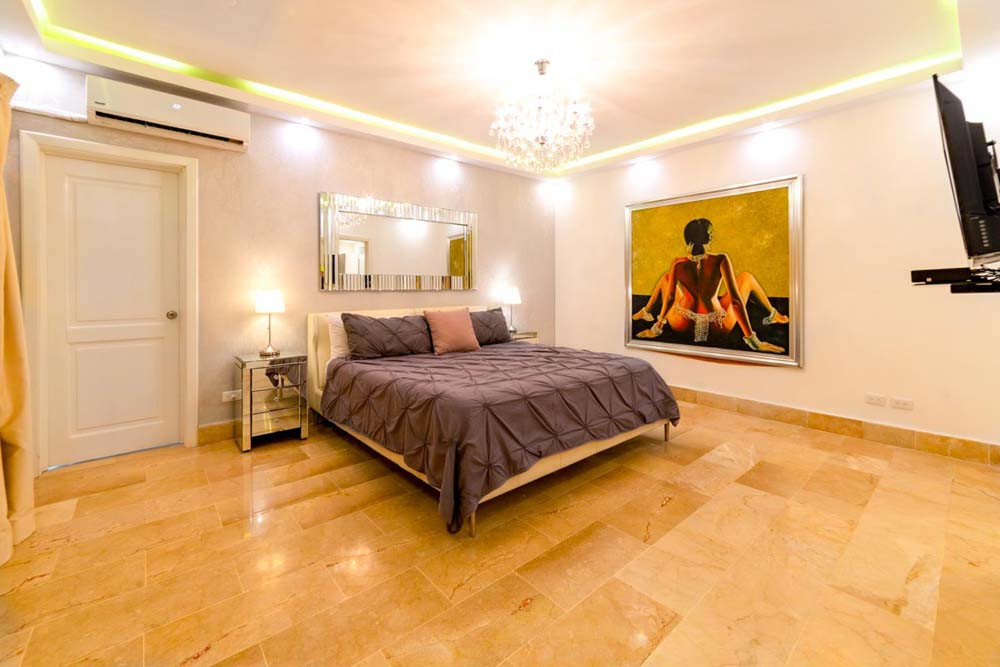 Master bedroom in a villa at Playa Palmera Beach Resort