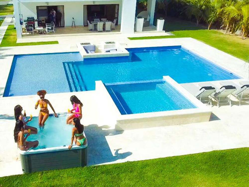 Modern swimming pool in a villa at Playa Palmera Beach Resort