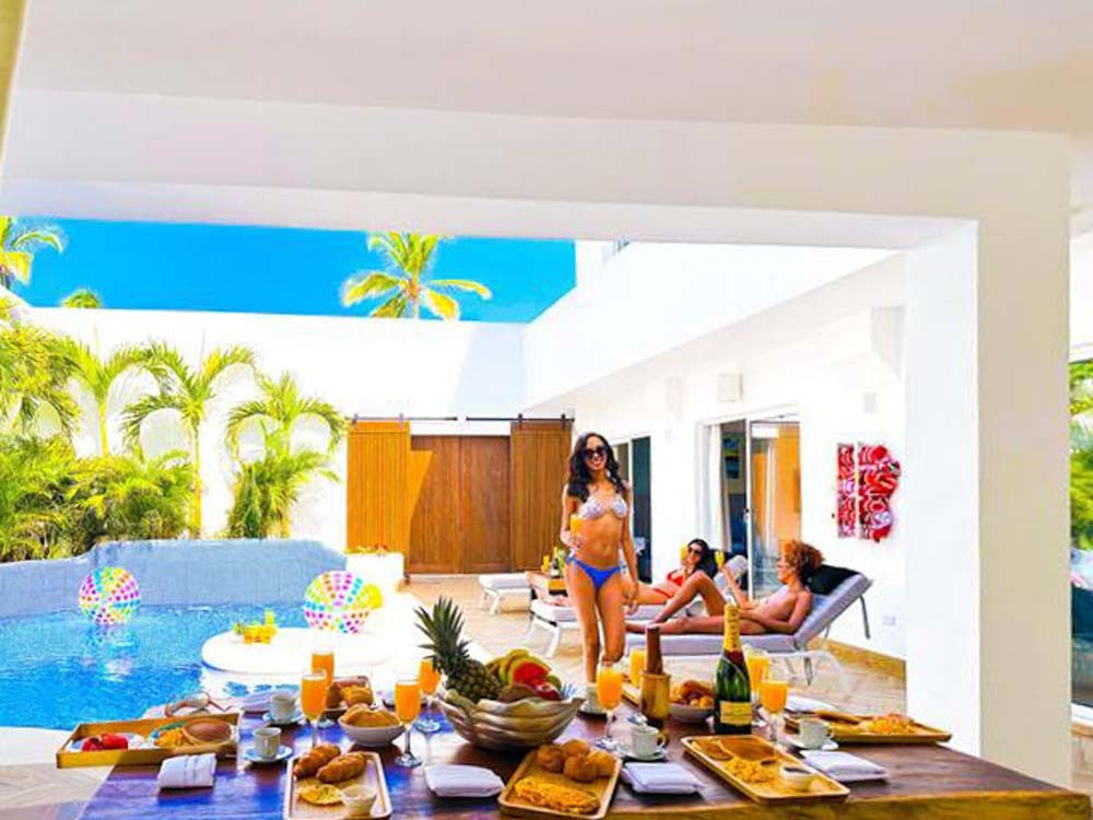 Party on a private patio in a villa at Playa Palmera Beach Resort