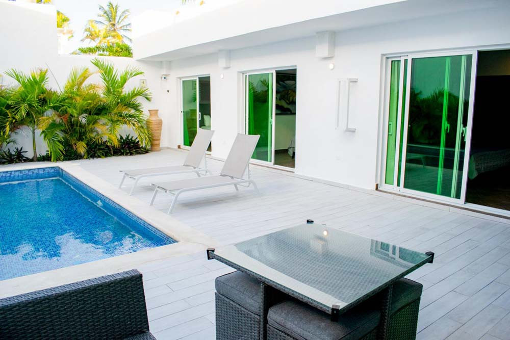 Private patio with private pool, sun loungers in villa at Playa Palmera Beach Resort