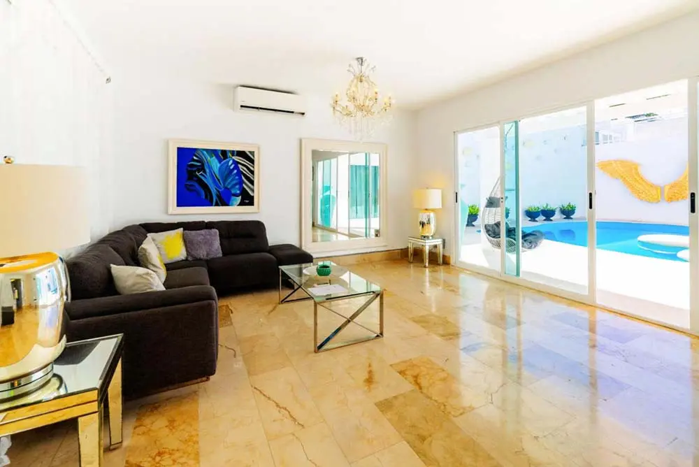 Living room in a villa at Playa Palmera Beach Resort
