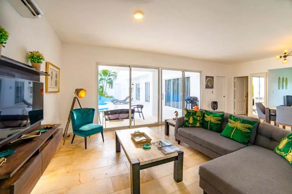 Spacious living room in a villa at Playa Palmera Beach Resort