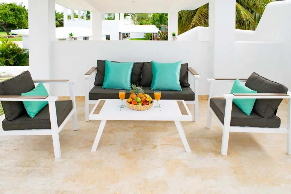 Garden furniture on the terrace of the villa at Playa Palmera Beach Resort