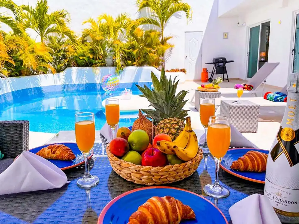 A table prepared for a party on the private patio of the villa at Playa Palmera Beach Resort